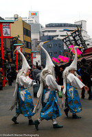 Three cranes rush to join rehersal, Tokyo, Japan
